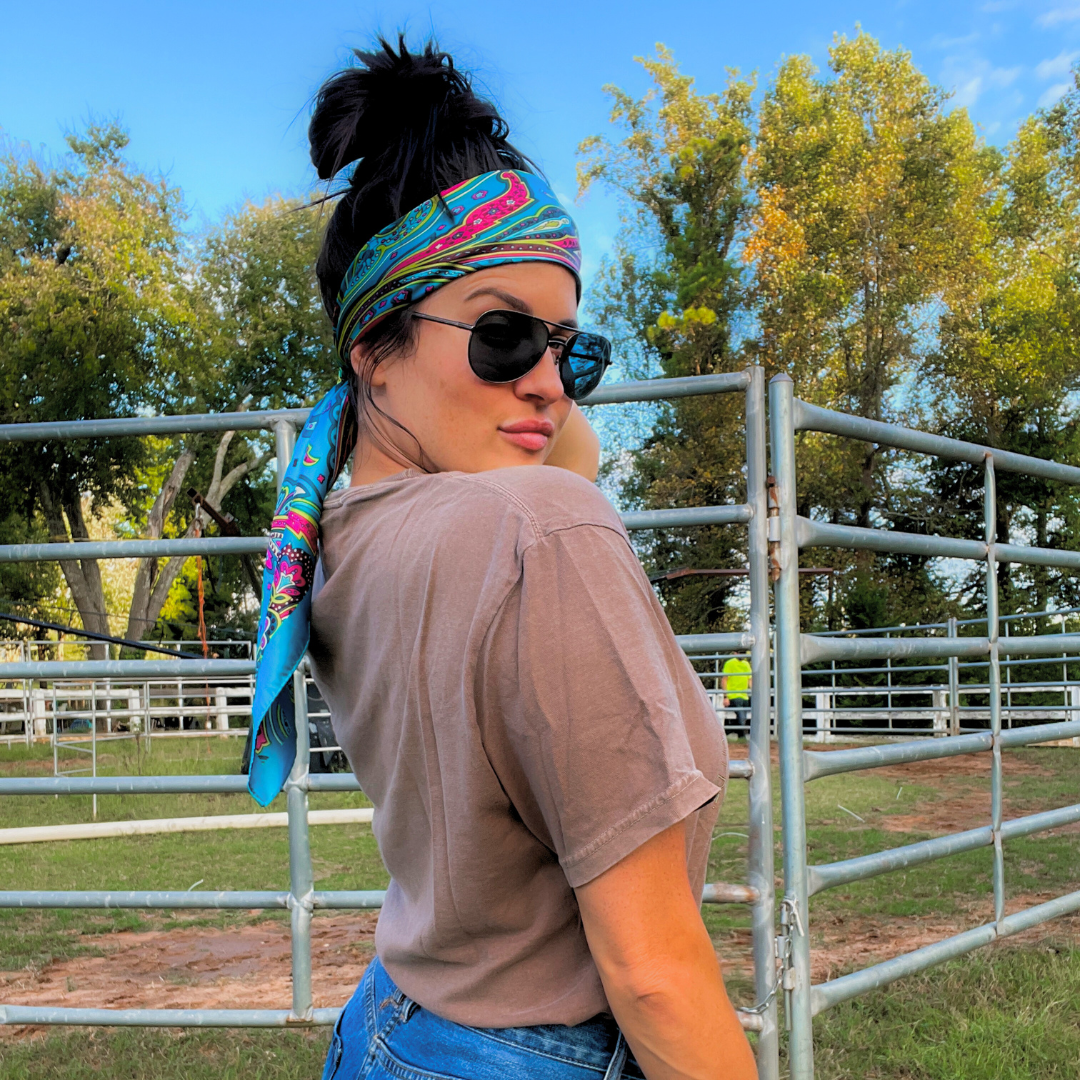 https://rodeodriveconchos.com/collections/all-wild-rags/products/35x35-blue-fun-floral-wild-rag-scarf-wr1019