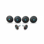 a collection of ornate, black metal knobs with blue stones or stones, arranged in a row.