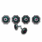 a collection of ornate, colorful buttons with intricate designs and sparkling gemstones.