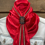 a woman wearing a red scarf and jacket