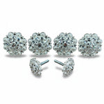 a collection of ornate, sparkling crystal or gemstone-encrusted objects, including buttons, knobs, and other decorative hardware.