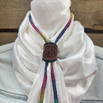 a close up of a white scarf on a mannequin