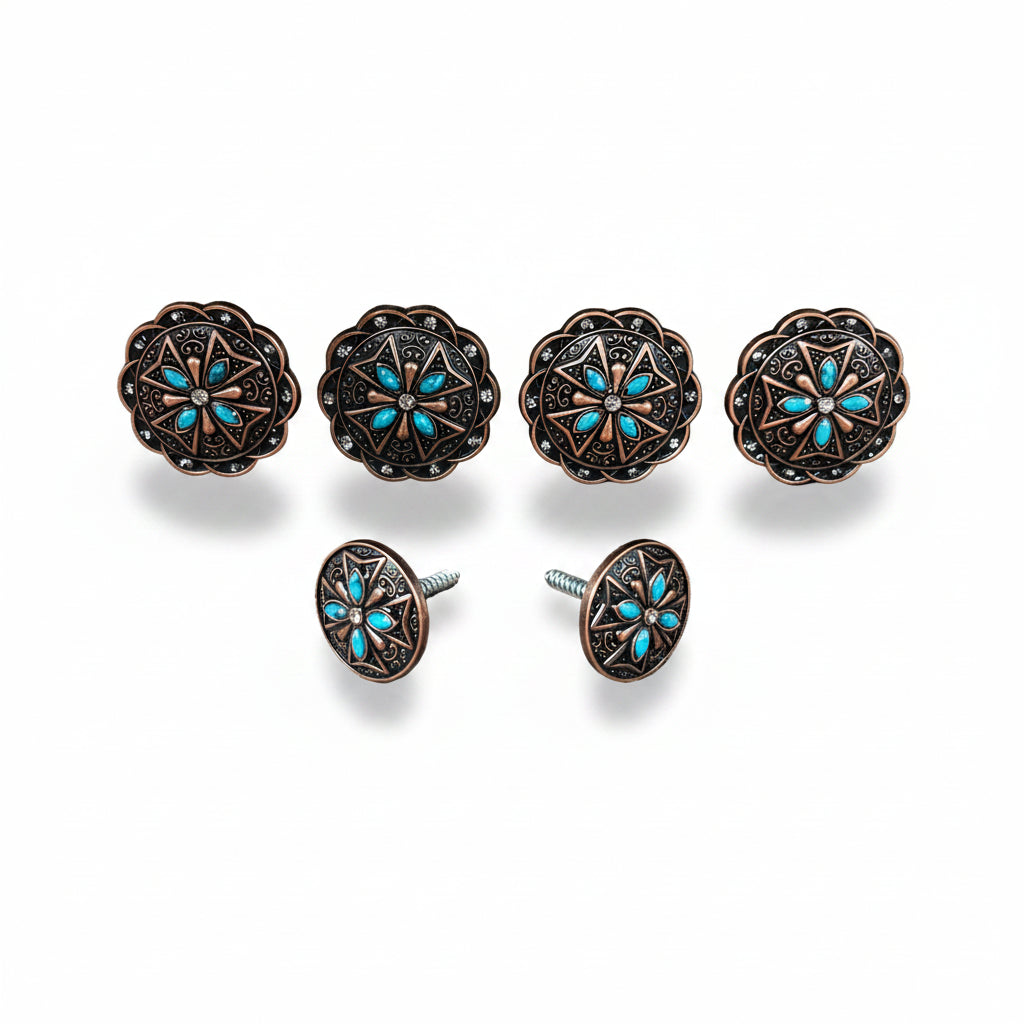 a collection of ornate, decorative knobs or buttons with intricate floral designs and turquoise accents.