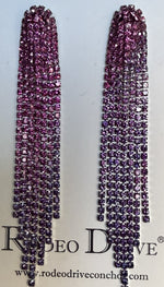 Long, dangling earrings with pink gemstones