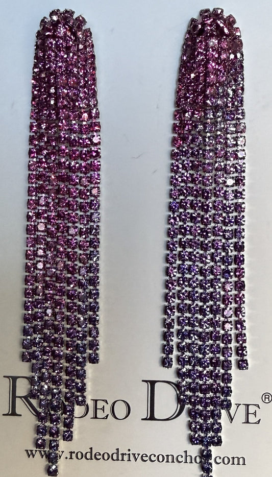 Long, dangling earrings with pink gemstones