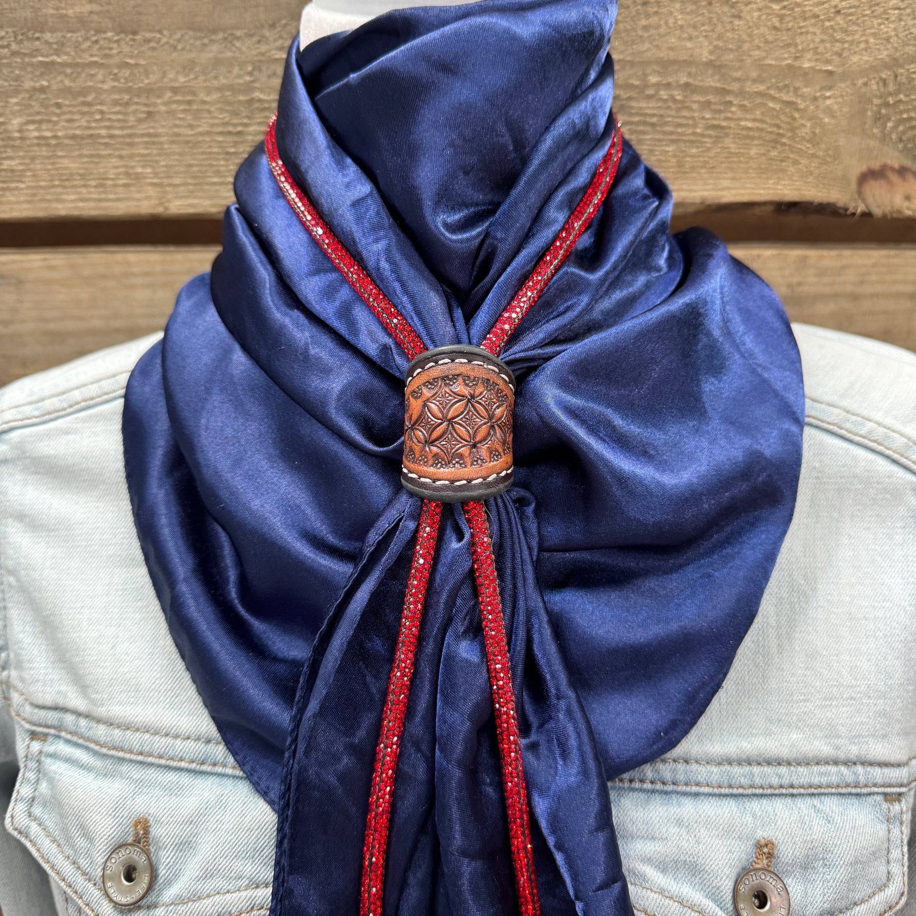 a close up of a scarf on a mannequin