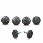 a collection of ornate, circular knobs or buttons with intricate designs, arranged in a row.