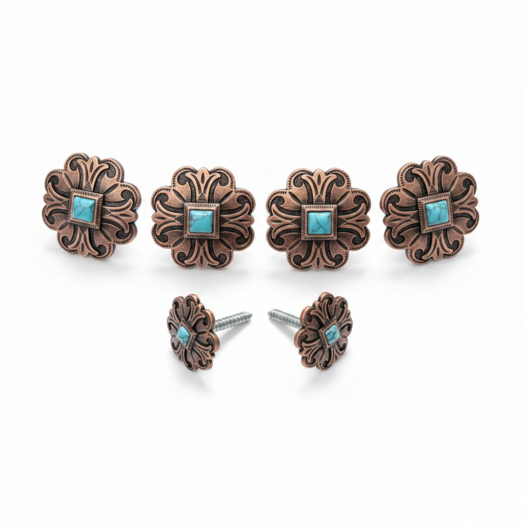 a collection of ornate, decorative metal pieces, including knobs and earrings, with turquoise stones.