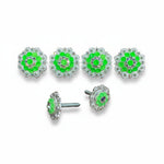 a collection of ornate, green-colored jewelry pieces, including earrings and buttons, with intricate designs and sparkling gemstones.