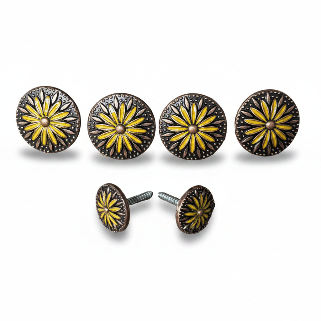 a collection of six round knobs with a yellow flower design, arranged in a row.